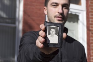 Hakan Ibisi carries a photograph of his grandfather in his wallet. (Photo by Wyatt Gallery/Hank Willis Thomas Studio)